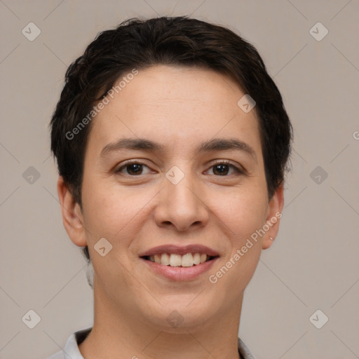 Joyful white young-adult female with short  brown hair and brown eyes