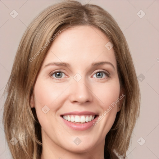 Joyful white young-adult female with medium  brown hair and green eyes