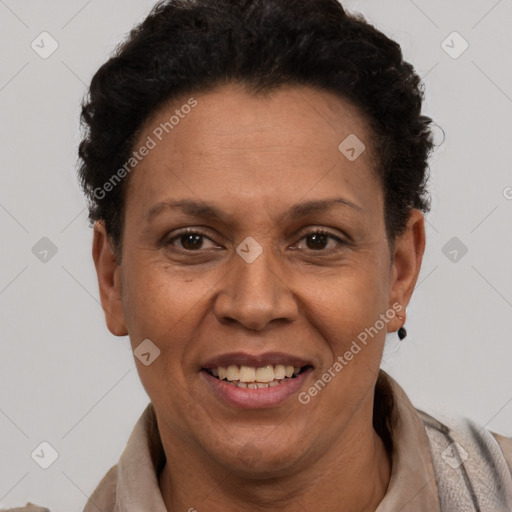 Joyful latino adult female with short  brown hair and brown eyes