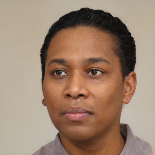 Neutral black young-adult female with short  black hair and brown eyes