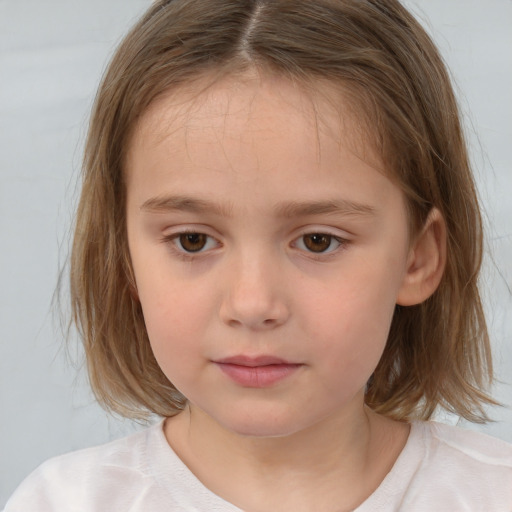 Neutral white child female with medium  brown hair and brown eyes