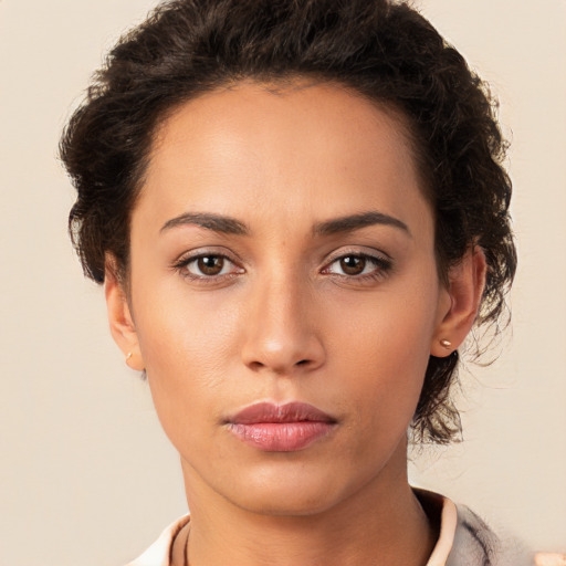 Neutral white young-adult female with short  brown hair and brown eyes