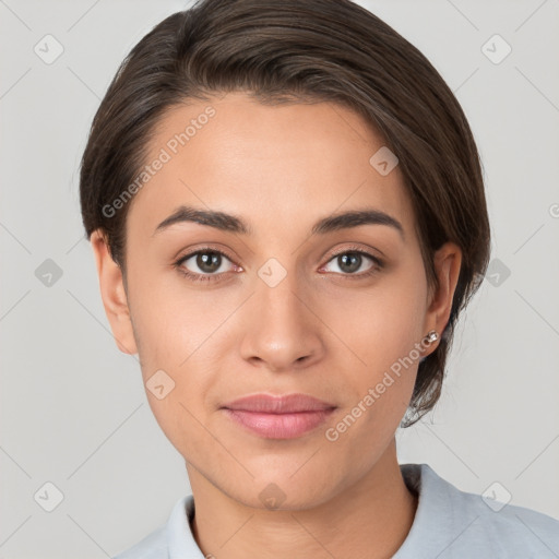 Joyful white young-adult female with short  brown hair and brown eyes