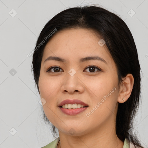 Joyful asian young-adult female with medium  brown hair and brown eyes