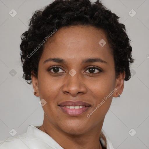 Joyful black young-adult female with short  brown hair and brown eyes