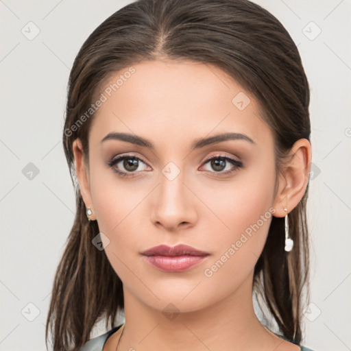 Neutral white young-adult female with medium  brown hair and brown eyes