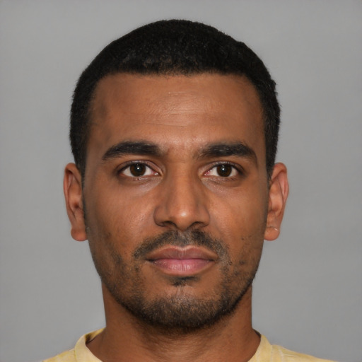 Neutral black young-adult male with short  black hair and brown eyes