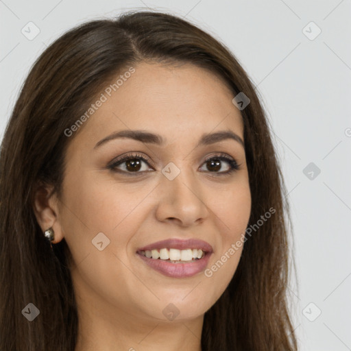 Joyful white young-adult female with long  brown hair and brown eyes