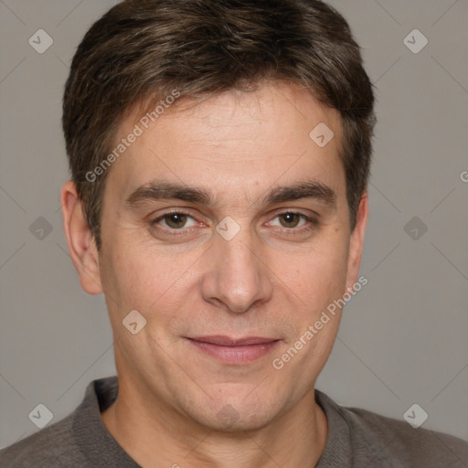 Joyful white adult male with short  brown hair and grey eyes