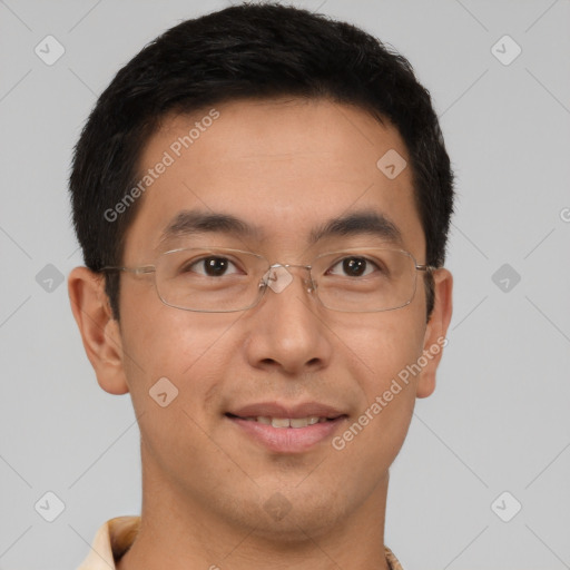 Joyful asian young-adult male with short  brown hair and brown eyes