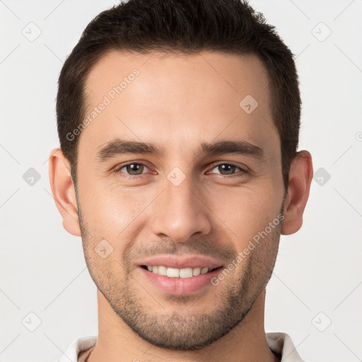 Joyful white young-adult male with short  brown hair and brown eyes