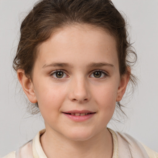 Joyful white child female with medium  brown hair and brown eyes