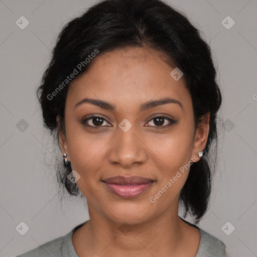 Joyful black young-adult female with medium  black hair and brown eyes