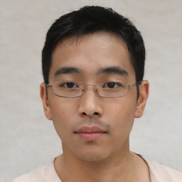 Neutral asian young-adult male with short  black hair and brown eyes