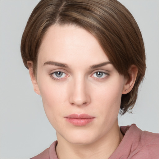 Neutral white young-adult female with medium  brown hair and grey eyes