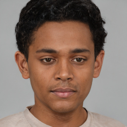 Neutral latino young-adult male with short  brown hair and brown eyes
