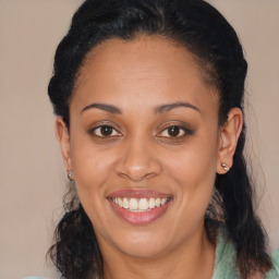 Joyful black young-adult female with medium  brown hair and brown eyes