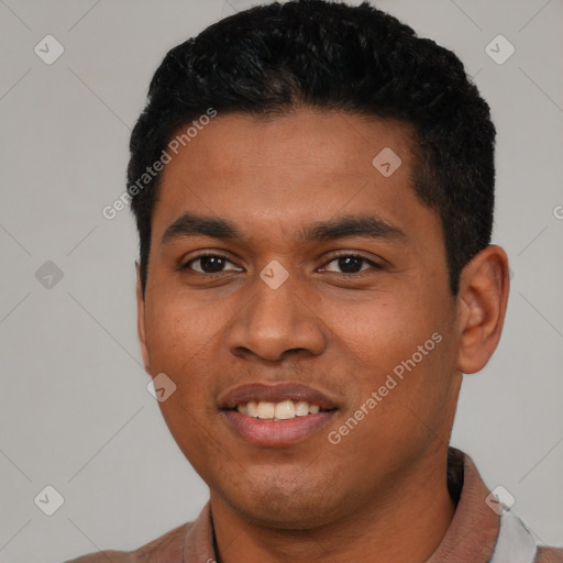 Joyful latino young-adult male with short  black hair and brown eyes