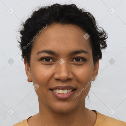 Joyful latino young-adult female with short  brown hair and brown eyes