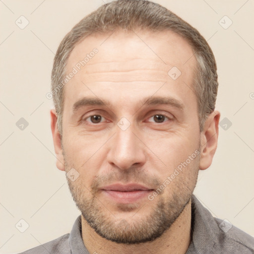 Neutral white adult male with short  brown hair and brown eyes