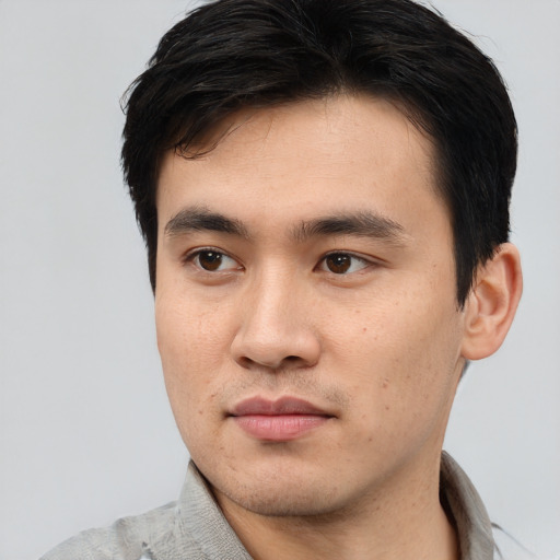 Neutral asian young-adult male with short  black hair and brown eyes
