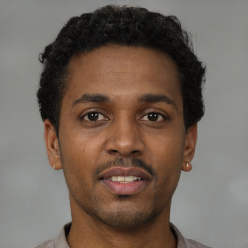 Neutral black young-adult male with short  brown hair and brown eyes