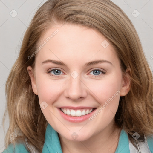 Joyful white young-adult female with medium  brown hair and blue eyes