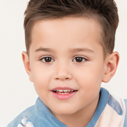 Joyful white child male with short  brown hair and brown eyes