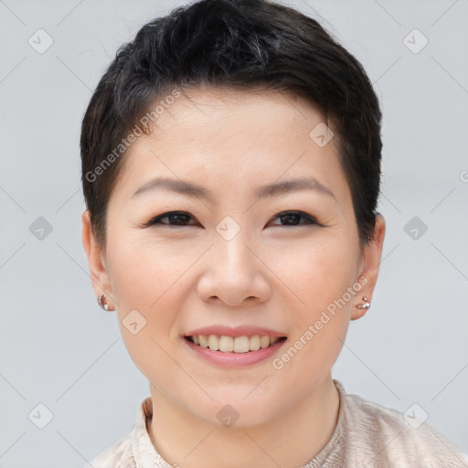 Joyful asian young-adult female with short  brown hair and brown eyes