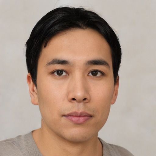 Neutral asian young-adult male with short  black hair and brown eyes