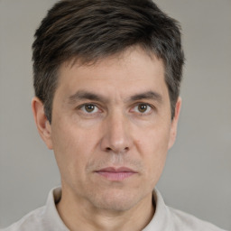 Neutral white adult male with short  brown hair and brown eyes