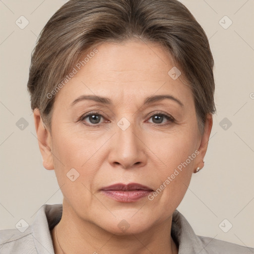 Joyful white adult female with short  brown hair and brown eyes