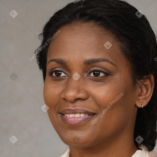 Joyful black young-adult female with medium  brown hair and brown eyes