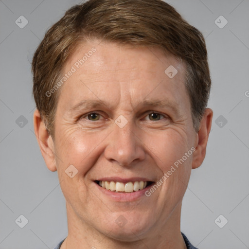 Joyful white adult male with short  brown hair and grey eyes