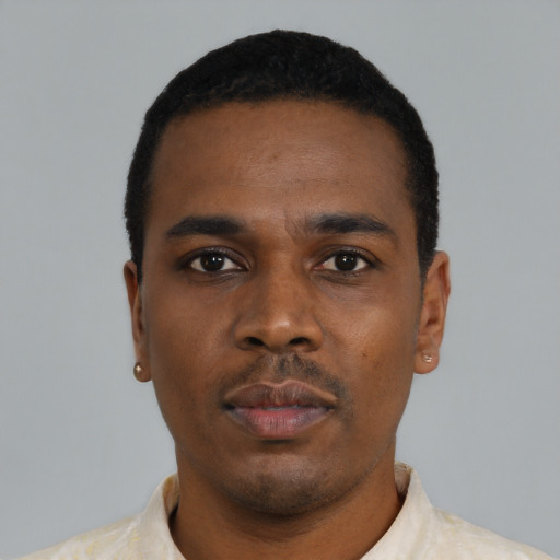 Neutral black young-adult male with short  black hair and brown eyes