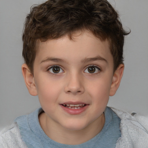 Joyful white child male with short  brown hair and brown eyes