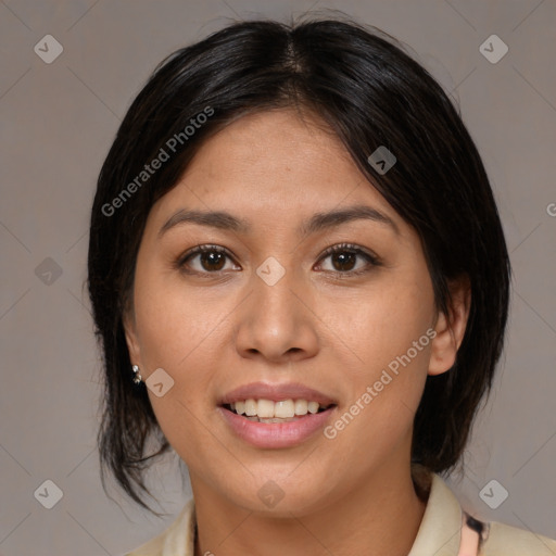 Joyful latino young-adult female with medium  brown hair and brown eyes