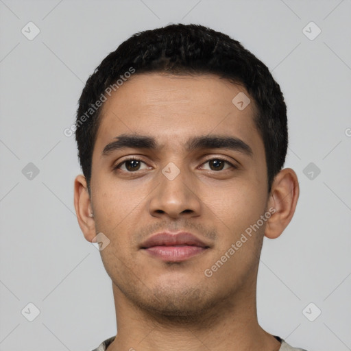 Neutral latino young-adult male with short  black hair and brown eyes