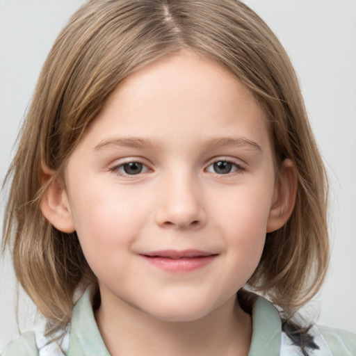 Joyful white child female with medium  brown hair and grey eyes