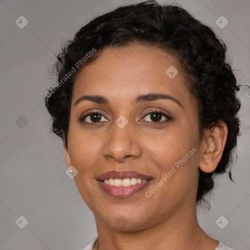 Joyful latino young-adult female with short  black hair and brown eyes