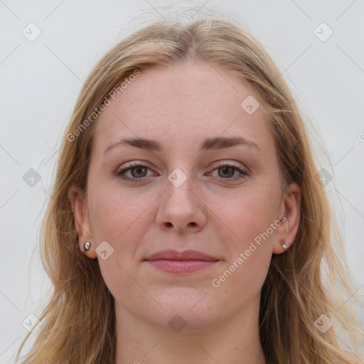 Joyful white young-adult female with long  brown hair and blue eyes