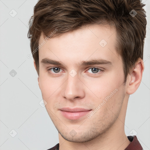 Neutral white young-adult male with short  brown hair and brown eyes