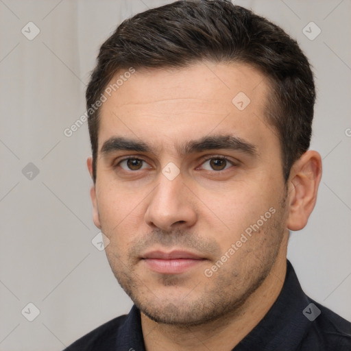 Neutral white young-adult male with short  brown hair and brown eyes