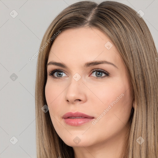 Neutral white young-adult female with long  brown hair and brown eyes