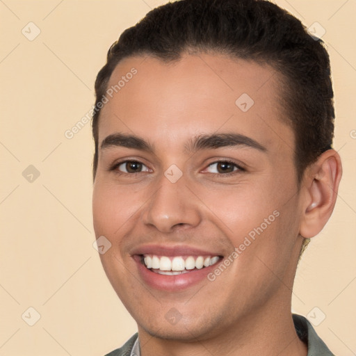 Joyful white young-adult male with short  brown hair and brown eyes