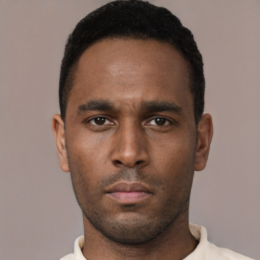 Neutral black young-adult male with short  black hair and brown eyes