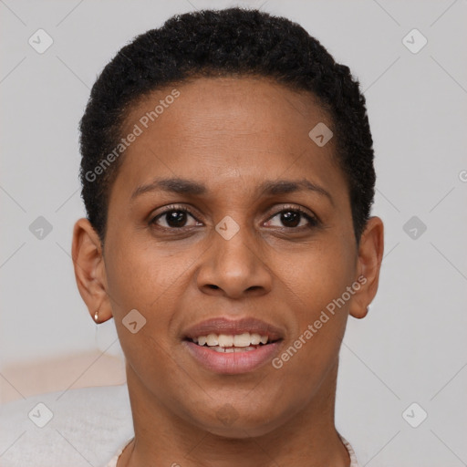 Joyful black young-adult female with short  brown hair and brown eyes