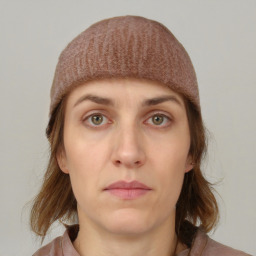 Neutral white young-adult female with medium  brown hair and brown eyes