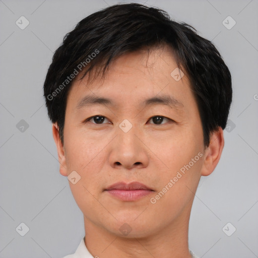 Neutral asian young-adult male with short  black hair and brown eyes