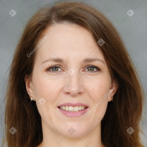 Joyful white adult female with medium  brown hair and grey eyes